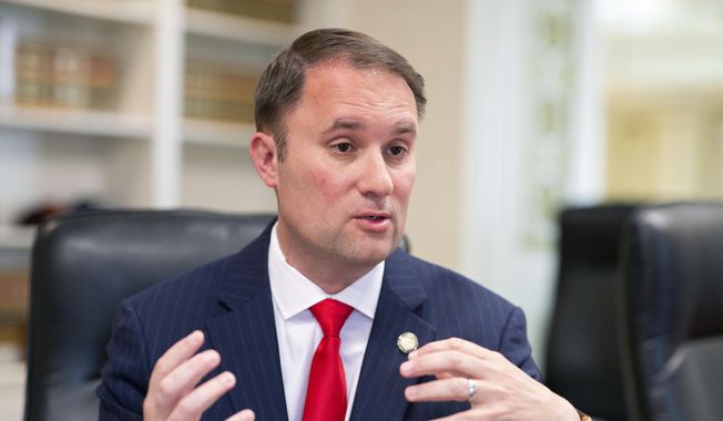 Virginia Attorney General Jason Miyares speaks during an interview at the Office of the Attorney General in Richmond, Va., Tuesday, May 9, 2023. (AP Photo/Ryan M. Kelly) ** FILE **