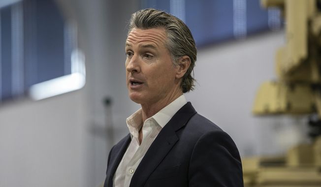 California Gov. Gavin Newsom speaks at a news conference in National City, Calif., on March 19, 2023. As California lawmakers hail the work of a historic panel that has for nearly two years delved into reparations proposals for African Americans, a state senator on the task force signaled large payments could face a tough road ahead in the Legislature. (Adriana Heldiz/The San Diego Union-Tribune via AP, Pool, File)