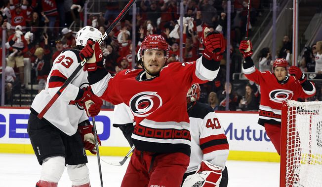 Carolina Hurricanes&#x27; Jesper Fast (71) celebrates his overtime goal against the New Jersey Devils in Game 5 of an NHL hockey Stanley Cup second-round playoff series in Raleigh, N.C., Thursday, May 11, 2023. (AP Photo/Karl B DeBlaker)