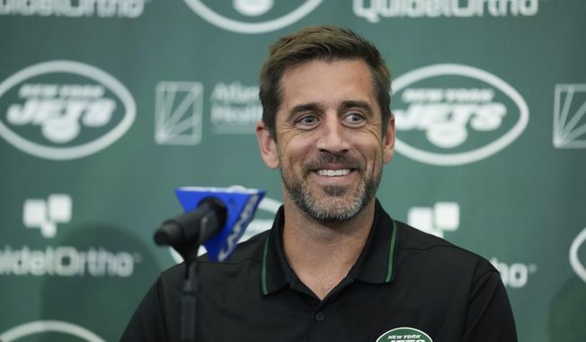New York Jets&#x27; quarterback Aaron Rodgers smiles during an NFL football news conference at the Jets&#x27; training facility in Florham Park, N.J., Wednesday, April 26, 2023. The Super Bowl champion Kansas City Chiefs will host the Detroit Lions on Sept. 7 to kick off the 2023 NFL season. And NFL fans will get their first look at star quarterback Aaron Rodgers in a Jets uniform when New York faces the Buffalo Bills on “Monday Night Football” on Sept. 11. That&#x27;s according to early details released Thursday, May 11, 2023, on this year’s NFL schedule. (AP Photo/Seth Wenig, File)