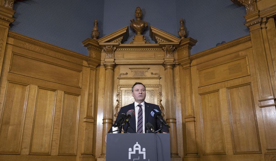 State Councillor Werner Salzmann addresses the media during a press conference of the Security Policy Committee of the State Council on the War Material Act in Bern, Switzerland, Thursday, May 11, 2023 (Anthony Anex/Keystone via AP)