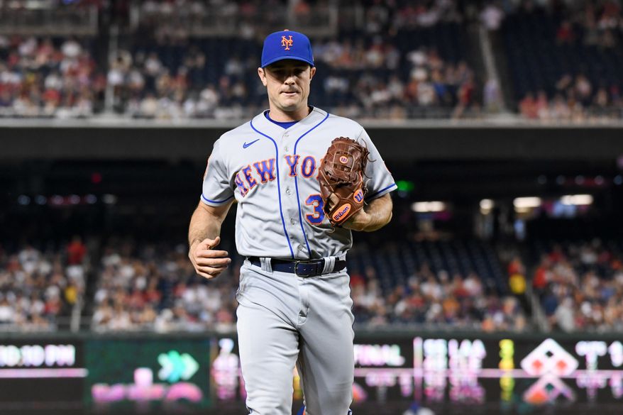 New York Mets relief pitcher David Robertson (30) walking off the mound in the eighth inning of an MLB game against the Washington Nationals at Nationals Park in Washington D.C., May 12, 2023. (Photo by Billy Sabatini/All-Pro Reels)