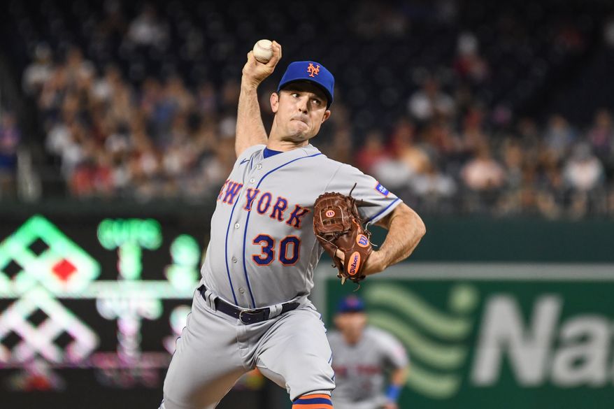 New York Mets relief pitcher David Robertson (30) throwing the pitch for his 1,000th career strikeout during the ninth inning of an MLB game against the Washington Nationals at Nationals Park in Washington D.C., May 12, 2023. (Photo by Billy Sabatini/All-Pro Reels)