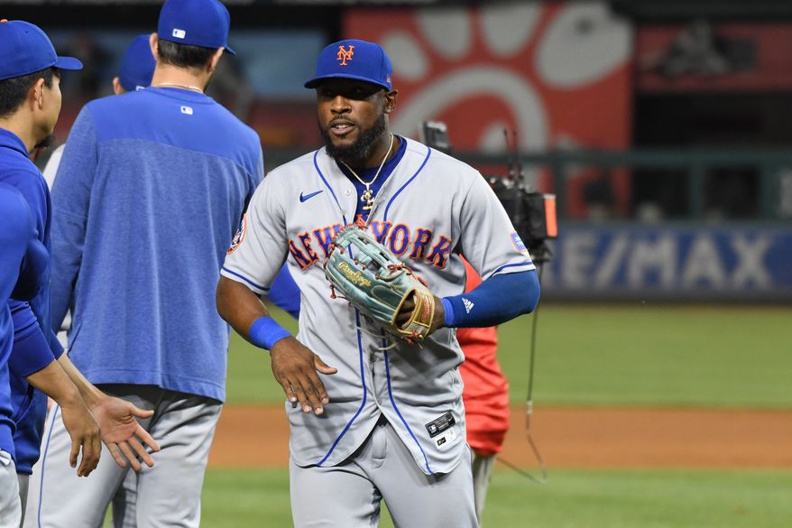 New York Mets right fielder Starling Marte (6) celebrating with teammates after the Mets' 3-2 victory over the Washington Nationals at Nationals Park in Washington D.C., May 12, 2023. (Photo by Billy Sabatini/All-Pro Reels)