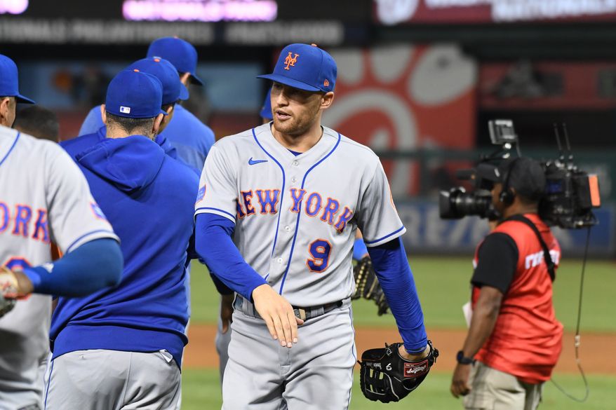 New York Mets centerfielder Brandon Nimmo (9) celebrating with teammates after the Mets’ 3-2 victory over the Washington Nationals at Nationals Park in Washington D.C., May 12, 2023. (Photo by Billy Sabatini/All-Pro Reels)