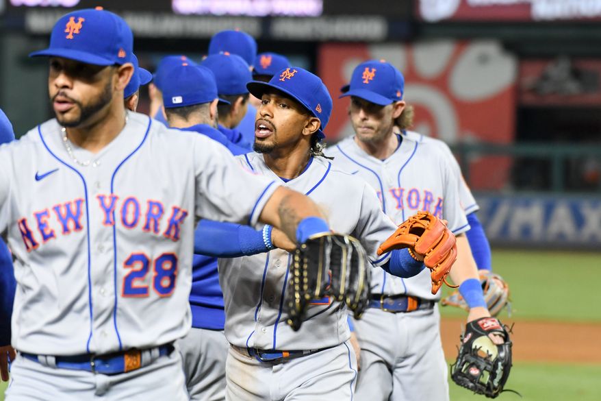 New York Mets players celebrating after the Mets’ 3-2 victory over the Washington Nationals at Nationals Park in Washington D.C., May 12, 2023. (Photo by Billy Sabatini/All-Pro Reels)