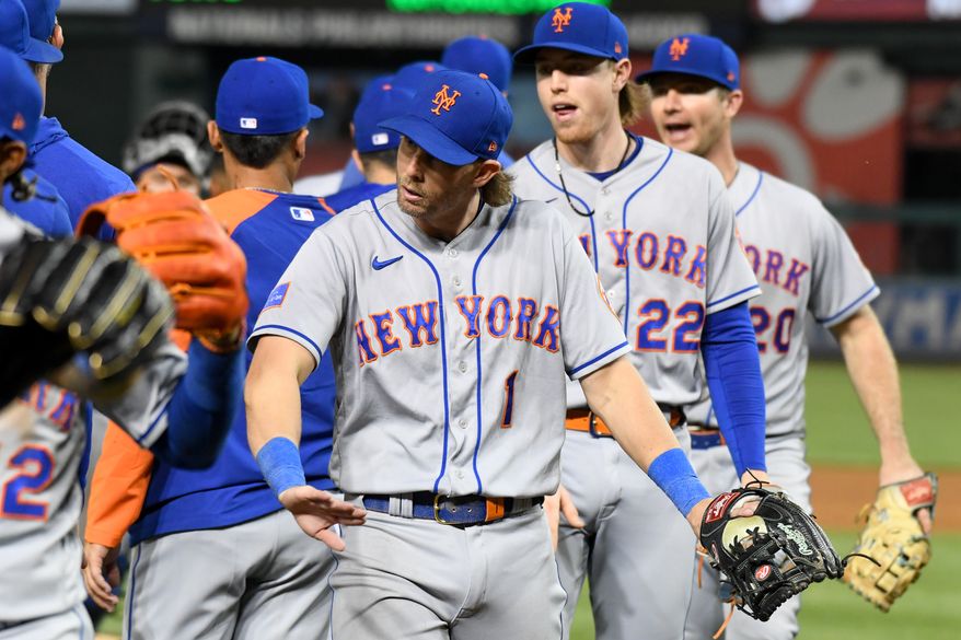 New York Mets players celebrating after the Mets’ 3-2 victory over the Washington Nationals at Nationals Park in Washington D.C., May 12, 2023. (Photo by Billy Sabatini/All-Pro Reels)