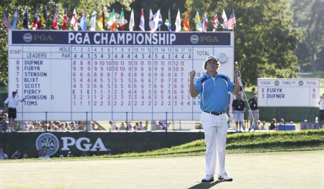 Jason Dufner celebrates after winning the PGA Championship golf tournament at Oak Hill Country Club, Sunday, Aug. 11, 2013, in Pittsford, N.Y. The PGA Championship returns to Oak Hill for the fourth time on May 18-21, 2023. (AP Photo/Julio Cortez, File)