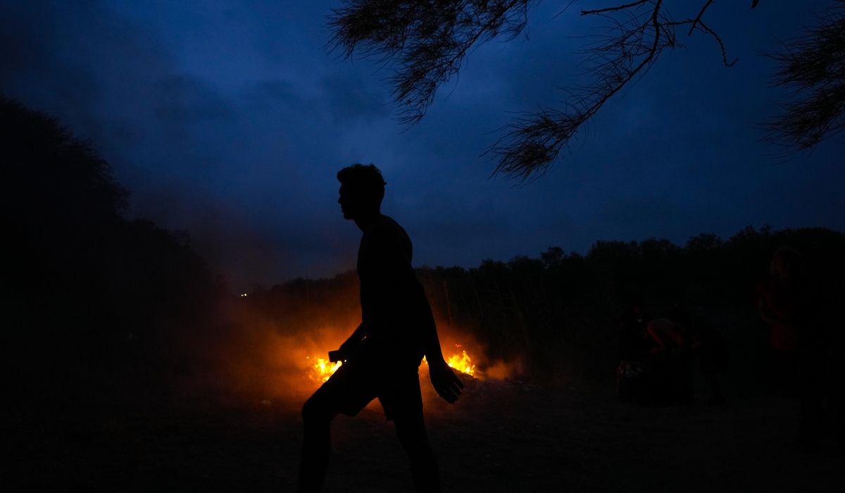 NextImg:Chaos on Mexico border averted, for now, as U.S. turns page in migration rules