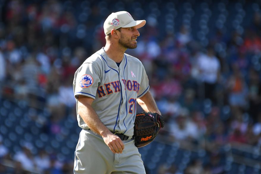 New York Mets starting pitcher Max Scherzer (21) waiting for the ball after a strike out during the first inning of an MLB game against the Washington Nationals at Nationals Park in Washington D.C., May 14, 2023. (Photo by Billy Sabatini/All-Pro Reels)