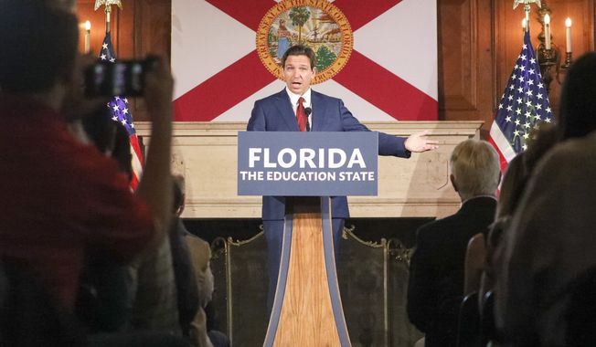 Gov. Ron DeSantis talks during a press conference before signing legislation on Monday, May 15, 2023, at New College of Florida in Sarasota, Fla. DeSantis signed a bill that blocks public colleges from using federal or state funding on diversity programs, addressing a concern of conservatives ahead of the Republican governor&#x27;s expected presidential candidacy. The law, which DeSantis proposed earlier this year, comes as Republicans across the country target programs on diversity, equity and inclusion in higher education. (Douglas R. Clifford/Tampa Bay Times via AP)