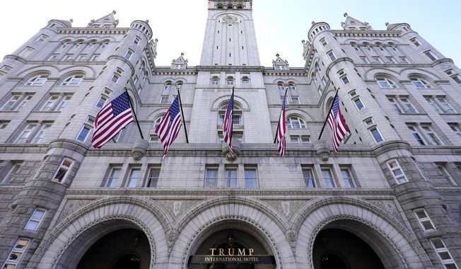 FILE - A view of The Trump International Hotel is seen, March 4, 2021, in Washington. The Supreme Court has agreed to hear a Biden administration appeal to limit lawsuits filed by members of Congress against the federal government, in a case that stems from disputes over what was the Trump International Hotel in Washington. (AP Photo/Julio Cortez, File)