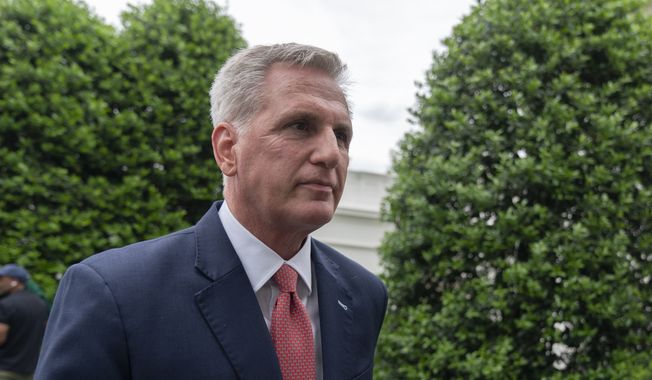 Speaker of the House Kevin McCarthy of Calif., walks back to the West Wing after speaking to reporters following a meeting with President Joe Biden at the White House, Tuesday, May 16, 2023, in Washington. (AP Photo/Manuel Balce Ceneta)