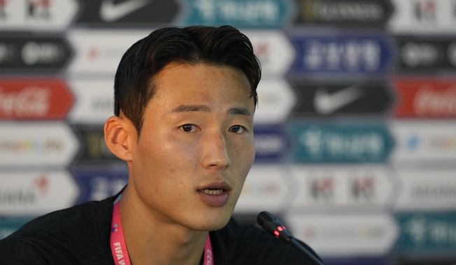 South Korea&#x27;s Son Jun-ho speaks during a press conference before a training session at Al Egla Training Site 5 in Doha, Qatar, Nov. 22, 2022. South Korean national soccer team midfielder Son has been detained in the northeastern Chinese province of Liaoning on suspicion of accepting a bribe, China&#x27;s Foreign Ministry said Tuesday, May 16, 2023. (AP Photo/Lee Jin-man, File)