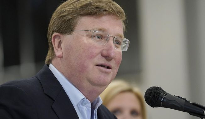 Mississippi Republican Gov. Tate Reeves addresses supporters at a campaign rally at Stribling Equipment in Richland, Miss., Wednesday, May 3, 2023. Reeves is seeking reelection to a second term. (AP Photo/Rogelio V. Solis)