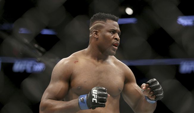 Francis Ngannou is shown during a heavyweight championship mixed martial arts bout against Stipe Miocic at UFC 220, Sunday, Jan. 21, 2018, in Boston. Ngannou&#x27;s reign as one of the top heavyweights in MMA will continue in the Professional Fighters League following the former champion’s contentious split with UFC. (AP Photo/Gregory Payan, File)