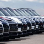 A line of unsold 2018 Cooper Clubmen sit in a long row at a Mini dealership, March 30, 2018, in Highlands Ranch, Colo. Lawmakers on Capitol Hill are pushing to keep AM radio in the nation&#x27;s cars. A bipartisan group in Congress on Wednesday, May 17, 2023, introduced the “AM for Every Vehicle Act.&quot; The bill calls on the National Highway Traffic Safety Administration to require automakers to keep AM radio in new cars at no additional cost. (AP Photo/David Zalubowski, File)