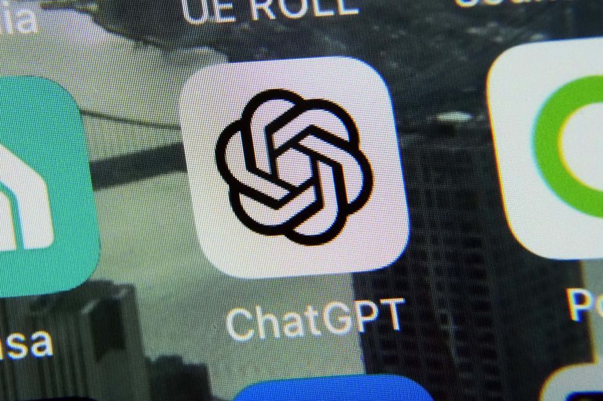 The ChatGPT app is displayed on an iPhone in New York, Thursday, May 18, 2023. (AP Photo/Richard Drew) ** FILE **