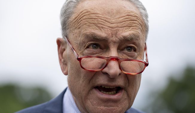 Senate Majority Leader Chuck Schumer of N.Y., speaks with reporters on Capitol Hill after returning from a debt ceiling meeting at the White House, Tuesday, May 16, 2023, in Washington. (AP Photo/Alex Brandon)
