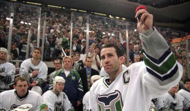 Hartford Whalers captain Kevin Dineen waves to the fans after the Whalers final NHL hockey game, Sunday, April 13, 1997, in Hartford, Conn., against the Tampa Bay Lightning. Connecticut Gov. Ned Lamont said Friday, May 19, 2023, he&#x27;s planning to meet with NHL Commissioner Gary Bettman about the possibility of moving the Arizona Coyotes to Hartford. Connecticut has not had an NHL team since the Hartford Whalers left for North Carolina in 1997. (AP Photo/Steve Miller, File)