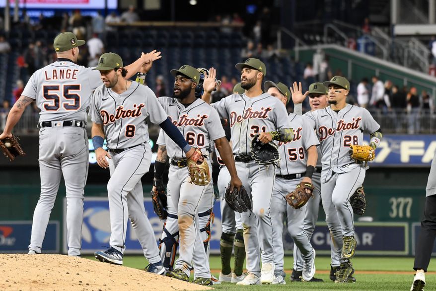 Detroit Tigers players congratulating each other after their 8-6 win over the Washington Nationals at Nationals Park in Washington D.C., May 19, 2023. (Photo by Billy Sabatini/All-Pro Reels)