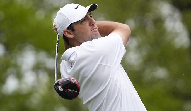 Scottie Scheffler watches his tee shot on the sixth hole during the second round of the PGA Championship golf tournament at Oak Hill Country Club on Friday, May 19, 2023, in Pittsford, N.Y. (AP Photo/Abbie Parr)