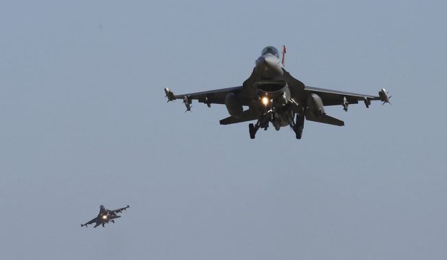 U.S. Air Force F-16 fighter jets fly over the Osan U.S. Air Base during a combined air force exercise with the United States and South Korea in Pyeongtaek, South Korea, Dec. 4, 2017. The U.S. has once again buckled under pressure from European allies and Ukraine&#x27;s leaders and agreed to provide more sophisticated weapons to the war effort. This time it&#x27;s all about F-16 fighter jets. (AP Photo/Ahn Young-joon, File)