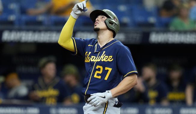 Milwaukee Brewers&#x27; Willy Adames reacts after his solo home run off Tampa Bay Rays pitcher Jalen Beeks during the second inning of a baseball game Sunday, May 21, 2023, in St. Petersburg, Fla. (AP Photo/Chris O&#x27;Meara)