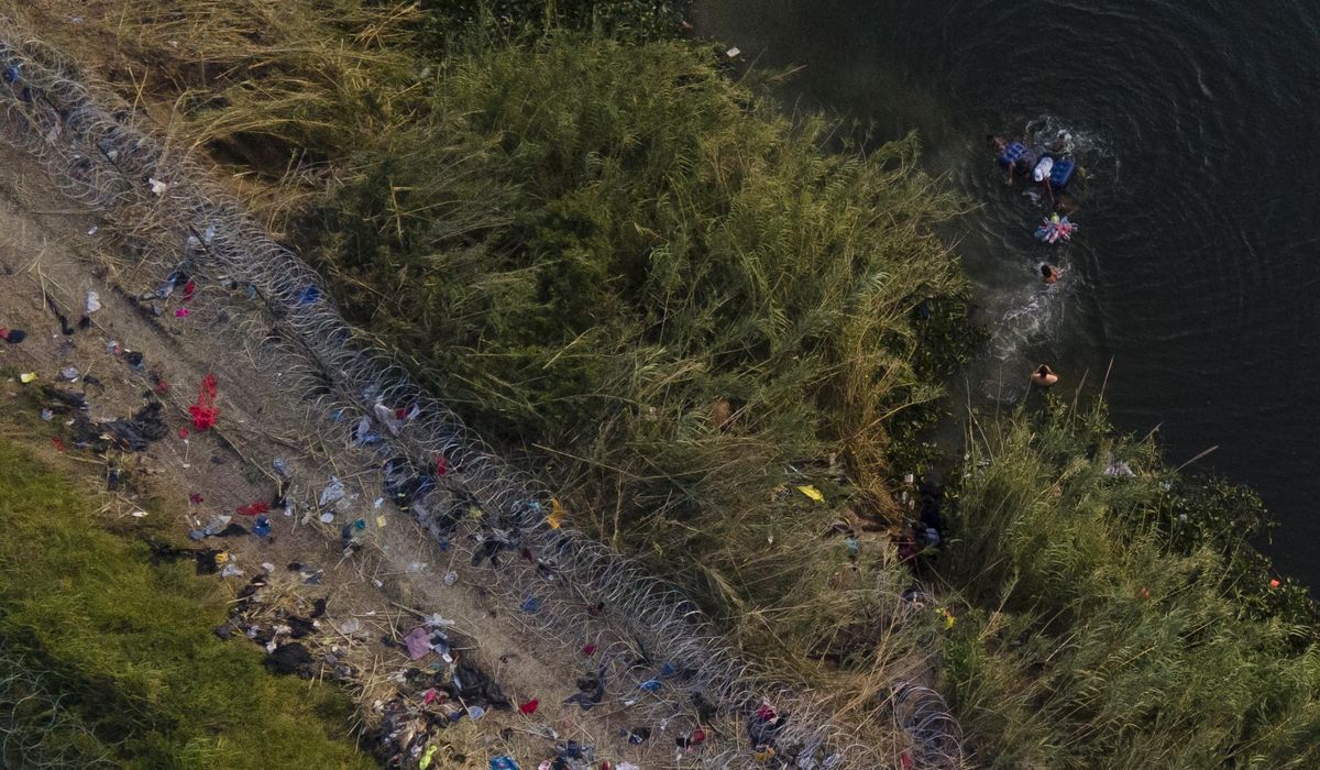 NextImg:Justices give OK to law banning encouragement of illegal immigration