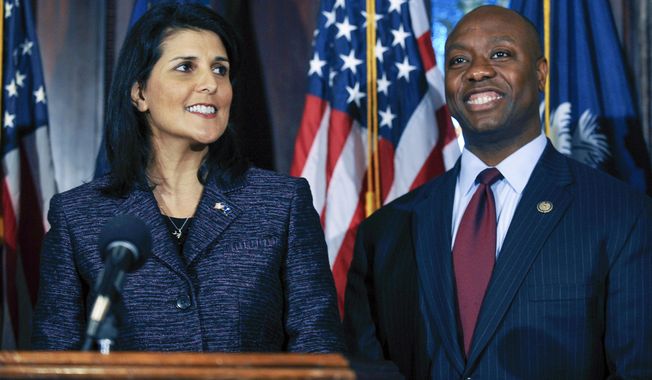 South Carolina Gov. Nikki Haley, left, announces Rep. Tim Scott, right, as Sen. Jim DeMint&#x27;s replacement in the U.S. Senate during a news conference at the South Carolina Statehouse, Dec. 17, 2012, in Columbia, S.C. Scott has filed paperwork to enter the 2024 Republican presidential race. He&#x27;ll be testing whether a more optimistic vision of America’s future can resonate with GOP voters who have elevated partisan brawlers in recent years. (AP Photo/Rainier Ehrhardt) **FILE**