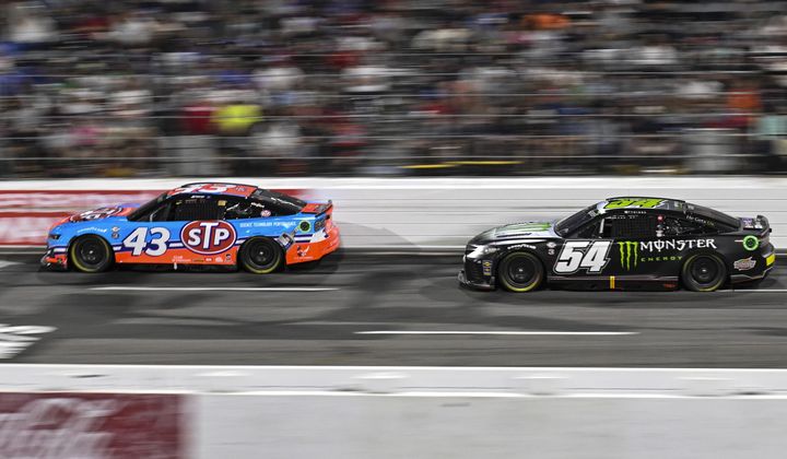 Erik Jones (43) and Ty Gibbs (54) compete during the NASCAR All-Star Cup Series auto race at North Wilkesboro Speedway, Sunday, May 21, 2023, in North Wilkesboro, N.C. (AP Photo/Matt Kelley)