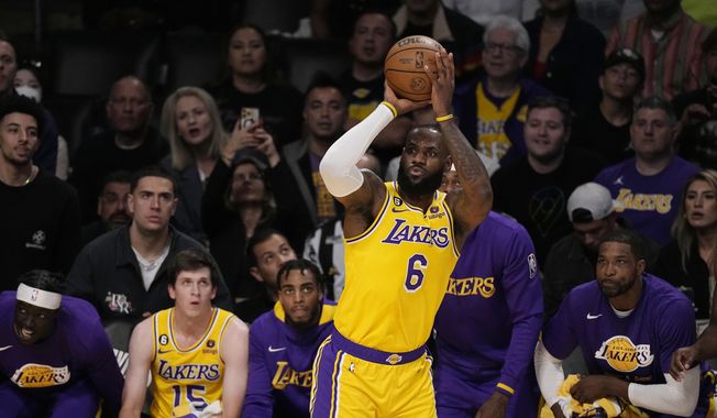 Los Angeles Lakers forward LeBron James shoots against the Denver Nuggets in the first half of Game 4 of the NBA basketball Western Conference Final series Monday, May 22, 2023, in Los Angeles. (AP Photo/Mark J. Terrill)