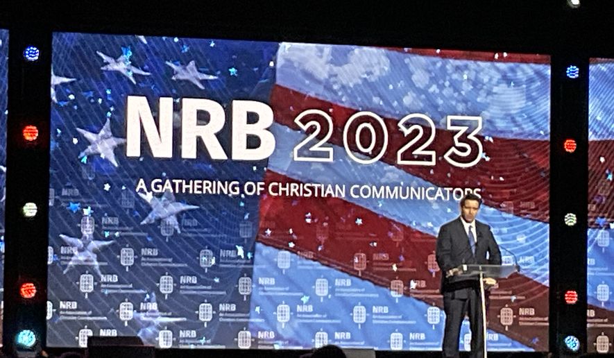 Gov. Ron DeSantis, Florida Republican, drew applause, cheers and multiple standing ovations at the National Religious Broadcasters convention in Orlando, Fla., on May 22. (Photo by Mark A. Kellner/The Washington Times)