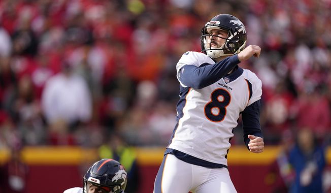 Denver Broncos place kicker Brandon McManus watches his 49-yard field goal during the first half of an NFL football game against the Kansas City Chiefs, Sunday, Jan. 1, 2023, in Kansas City, Mo. The Broncos severed ties with McManus on Tuesday, May 23, 2023, releasing the last holdover player from the team that captured Super Bowl 50. (AP Photo/Charlie Riedel) **FILE**