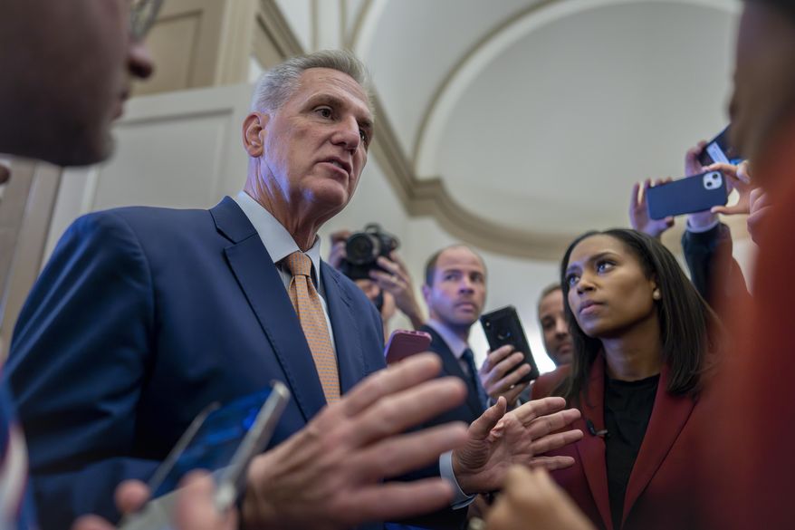 Speaker of the House Kevin McCarthy, R-Calif., is questioned by reporters after the GOP leader spoke privately to his Republican colleagues, at the Capitol in Washington, Tuesday, May 23, 2023. (AP Photo/J. Scott Applewhite)