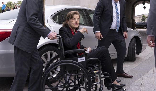 Sen. Dianne Feinstein, D-Calif., is assisted to a wheelchair by staff as she returns to the Senate after a more than two-month absence, at the Capitol in Washington, Wednesday, May 10, 2023. Feinstein&#x27;s ongoing medical struggles have raised a sensitive political question with no easy answer: Who would California Democratic Gov. Gavin Newsom pick to replace her if the seat became vacant? (AP Photo/J. Scott Applewhite, File)