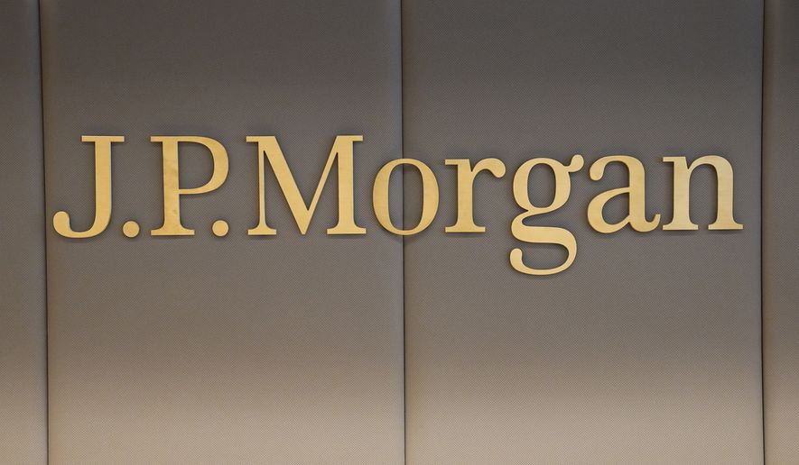 The logo of JPMorgan bank is pictured at the new French headquarters of JP Morgan bank, Tuesday, June 29, 2021, in Paris. JPMorgan Chase is defending itself against a lawsuit by the U.S. Virgin Islands accusing it of empowering Jeffrey Epstein to abuse teenage girls. Lawyers for the giant bank said in court papers Tuesday, May 23, 2023, that it was the islands that enabled the financier to commit his crimes. (AP Photo/Michel Euler, Pool, File)