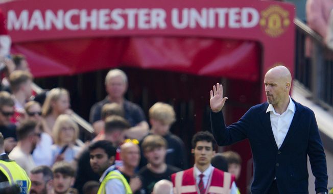 Manchester United&#x27;s head coach Erik ten Hag waves to fans prior the English Premier League soccer match between Manchester United and Wolverhampton at the Old Trafford stadium in Manchester, England, Saturday, May 13, 2023. (AP Photo/Jon Super)