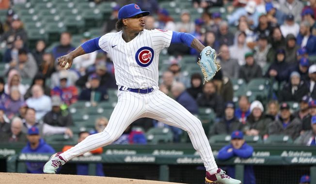 Chicago Cubs starting pitcher Marcus Stroman delivers during the first inning of the team&#x27;s baseball game against the New York Mets on Wednesday, May 24, 2023, in Chicago. (AP Photo/Charles Rex Arbogast)