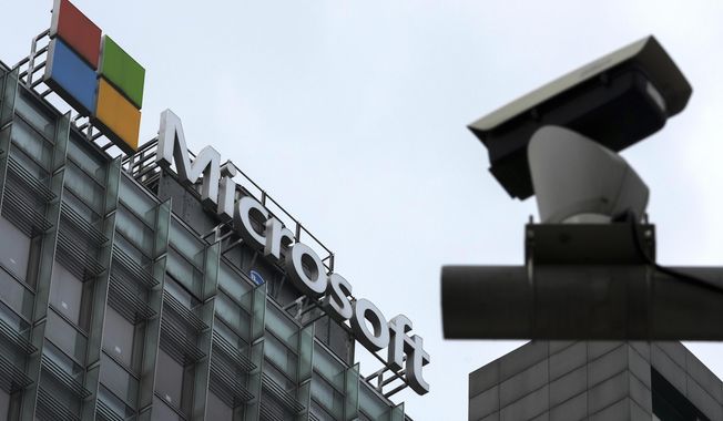 A security surveillance camera is seen near the Microsoft office building in Beijing, July 20, 2021. State-backed Chinese hackers have been targeting U.S. critical infrastructure and could be laying the technical groundwork for the potential disruption of critical communications between the U.S. and Asia during future crises, Microsoft said Wednesday, May 24, 2023. (AP Photo/Andy Wong, File)