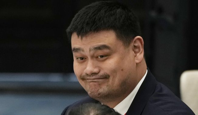 Former NBA basketball player Yao Ming attends a luncheon during the forum titled Chinese Modernization and the World held at The Grand Halls in Shanghai, on April 21, 2023. Yao has stepped down as head of China’s struggling national league. (AP Photo/Ng Han Guan, File)