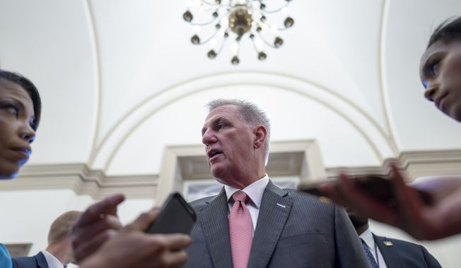 Speaker of the House Kevin McCarthy, R-Calif., talks with reporters as debt limit negotiations sprint into the final stages, at the Capitol in Washington, Thursday, May 25, 2023. (AP Photo/J. Scott Applewhite)