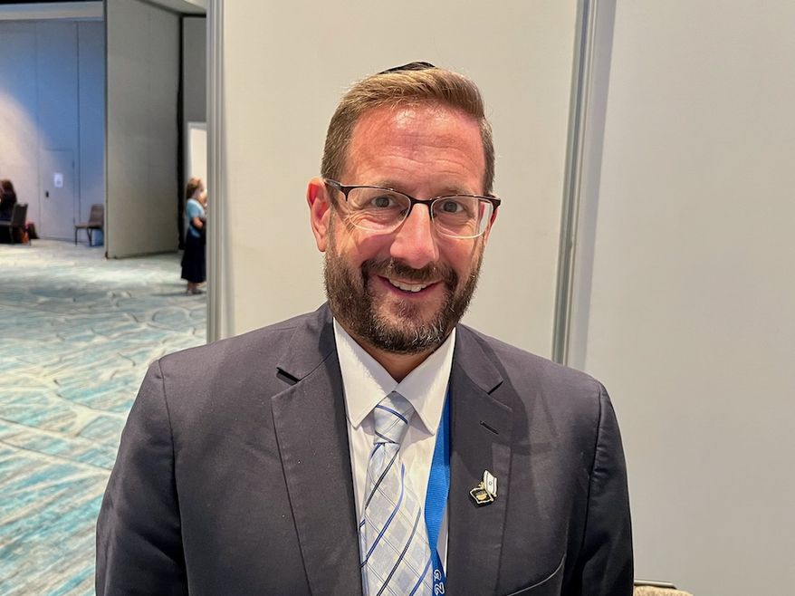 Rabbi Dov Lipman, who heads Yad L'Olim, a charity helping emigrants to Israel, says many evangelical Christians are among its supporters. He attended the National Religious Broadcasters convention in Orlando, Florida, during the week of May 22, 2023. (Photo by Mark A. Kellner/The Washington Times)
