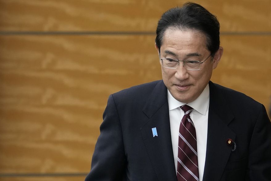 Japanese Prime Minister Fumio Kishida arrives for a bilateral meeting with Laos' President Thongloun Sisoulith, at the prime ministers's office in Tokyo, Japan, Thursday, May 25, 2023.(AP Photo/Shuji Kajiyama, Pool)