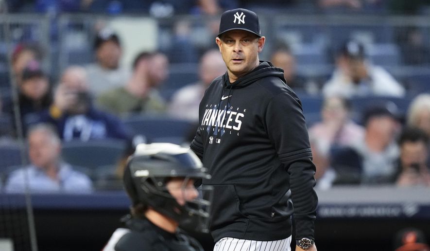 New York Yankees manager Aaron Boone leaves the field after being ejected during the third inning of the team&#x27;s baseball game against the Baltimore Orioles on Thursday, May 25, 2023, in New York. (AP Photo/Frank Franklin II)