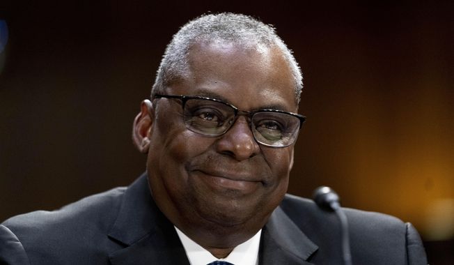 Secretary of Defense Lloyd Austin smiles as he appears before a Senate Appropriations hearing on the President&#x27;s proposed budget request for fiscal year 2024, on Capitol Hill in Washington, Tuesday, May 16, 2023. (AP Photo/Andrew Harnik)