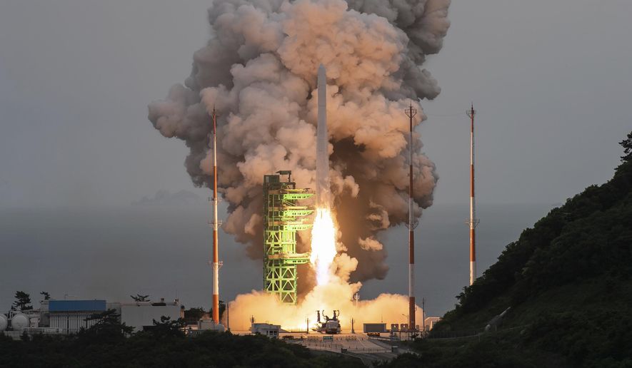 In this photo released by the Korea Aerospace Research Institute, the Nuri rocket lifts off from a launch pad at the Naro Space Center in Goheung, South Korea, Thursday, May 25, 2023. South Korea launched the commercial-grade satellite Thursday for the first time as part of its growing space development program, as rival North Korea is pushing to place its first military spy satellite into orbit. (Korea Aerospace Research Institute via AP)