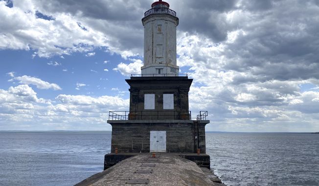 The Keweenaw Waterway Lower Entrance Light stands in Keweenaw Bay, June 2, 2022, in Chassell, Mich. The federal government&#x27;s annual effort to give away or sell lighthouses that are no longer needed for navigation purposes includes 10 lighthouses this year. (Luke Barrett/General Services Administration via AP)