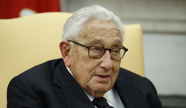 Former Secretary of State Henry Kissinger speaks during a meeting with President Donald Trump in the Oval Office of the White House, Tuesday, Oct. 10, 2017, in Washington. Kissinger marks his 100th birthday on Saturday, May 27, 2023, outlasting many of his political contemporaries who guided the United States through one of its most tumultuous periods including the presidency of Richard Nixon and the Vietnam War. (AP Photo/Evan Vucci, File)