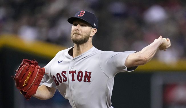 Boston Red Sox starting pitcher Chris Sale throws to an Arizona Diamondbacks batter during the first inning of a baseball game Friday, May 26, 2023, in Phoenix. (AP Photo/Ross D. Franklin)